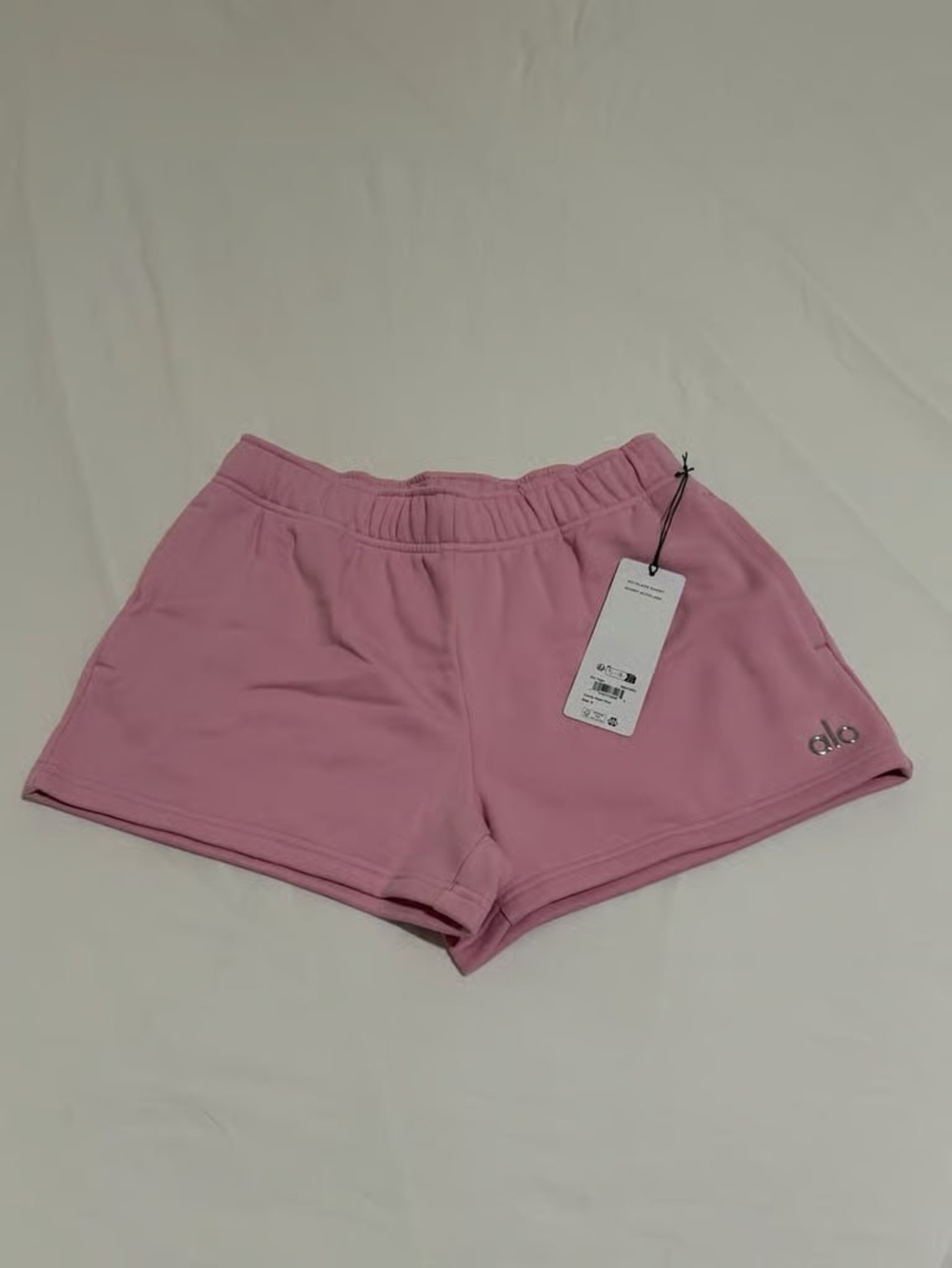 ALO Yoga Relaxed High-Rise Athletic Shorts in Light Pink - Picture 2 of 4